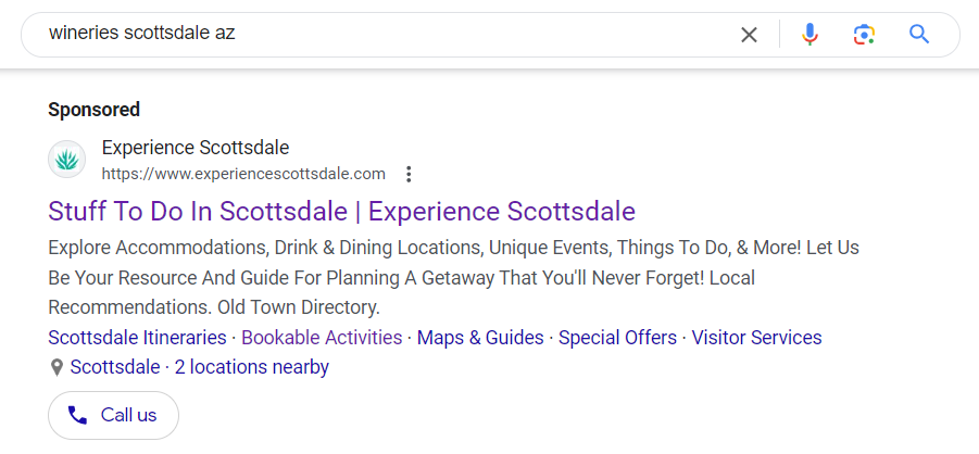 Ein Beispiel für ein Anruf-Asset in einer Desktop-Anzeige in der Google-Suche.